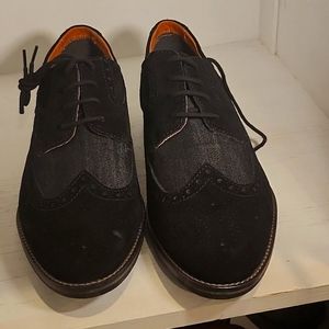 Black mixed media wingtip oxfords